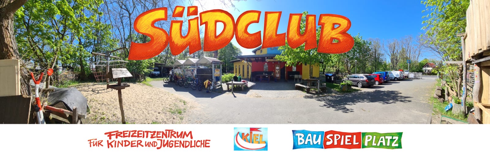 Südclub – Freizeitzentrum für Kinder und Jugendliche mit Bauspielplatz: Panoramablick auf das bunte Clubhaus und den Hof